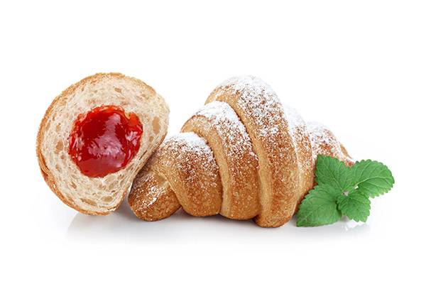 Croissant with powdered sugar and strawberry jam filling.
